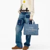The Joy Denim Medium Tote Bag
